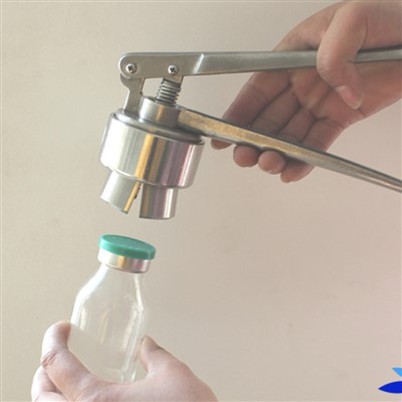 צבת מכסה ידנית