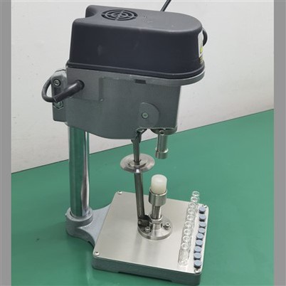 מכונת מכסה קטנה לבקבוקונים חשמליים